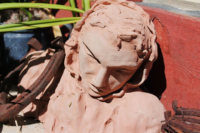clay sculpture being worked on